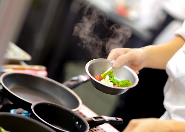 Chef preparing food, meal, in the kitchen, chef cooking, Chef decorating dish