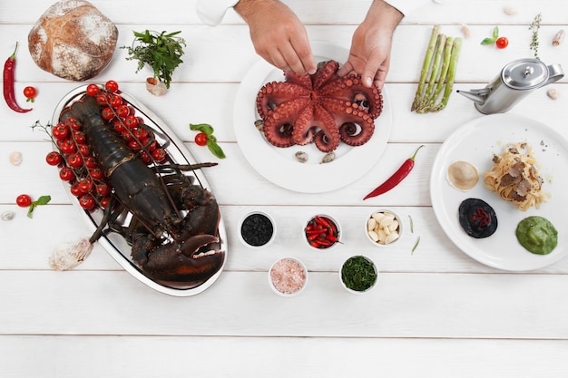 Chef preparing fresh octopus