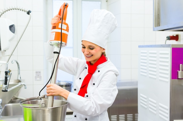 Chef preparing ice cream with food processor 