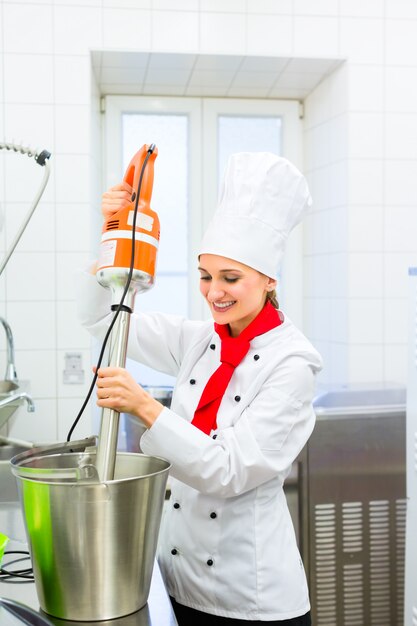 Chef preparing ice cream with food processor 