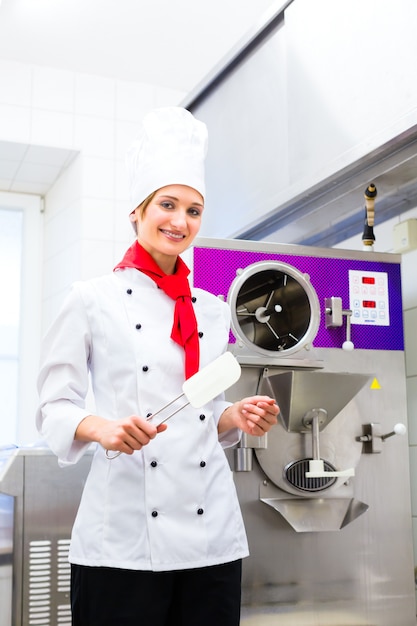 Chef preparing ice cream with machine