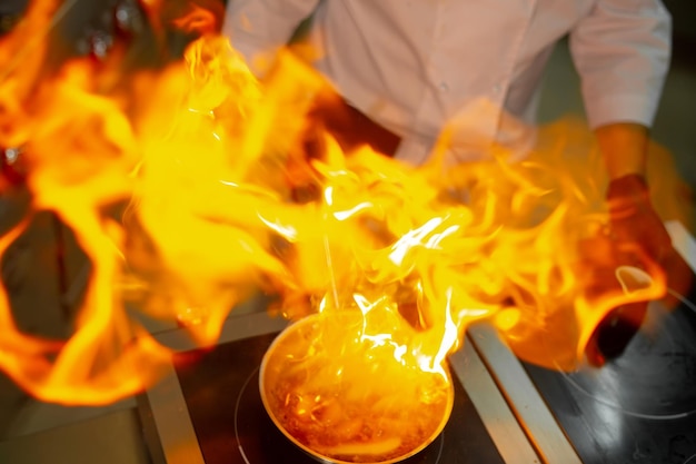 chef preparing ludo in a restaurant for guests