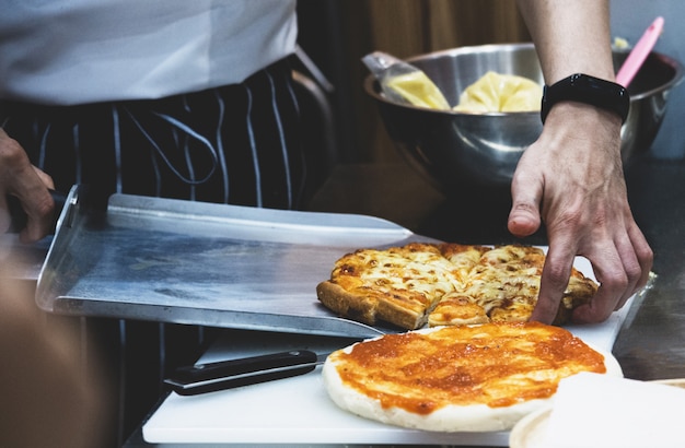 Chef preparing pizza , The process of making pizza 