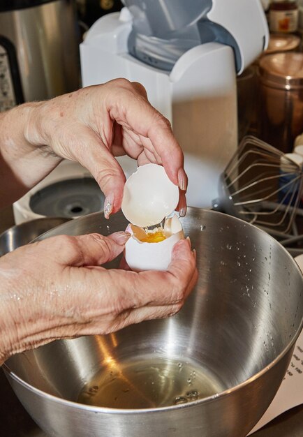 Chef separates the yolk from the protein to make the pie