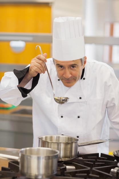 Chef tasting his soup