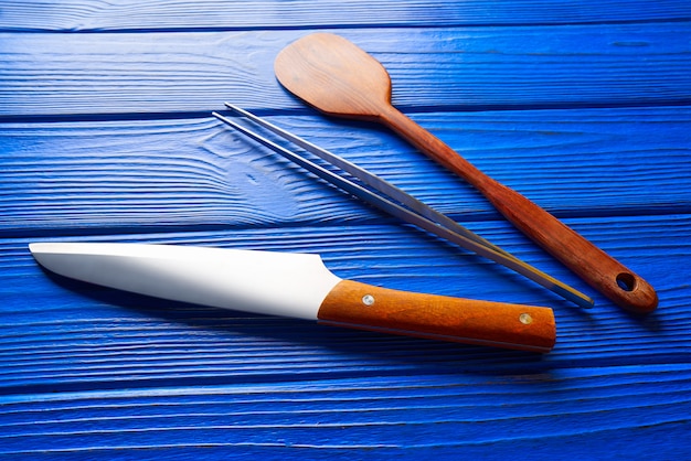 Chef tools on a blue wooden background