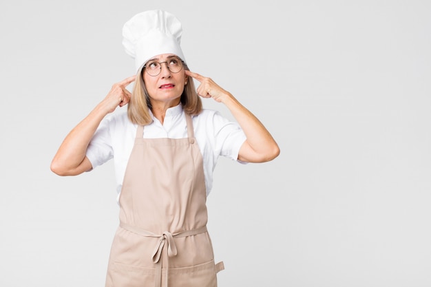 chef woman feeling confused or doubting