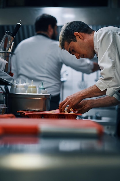 Photo chef working in a professional kitchen