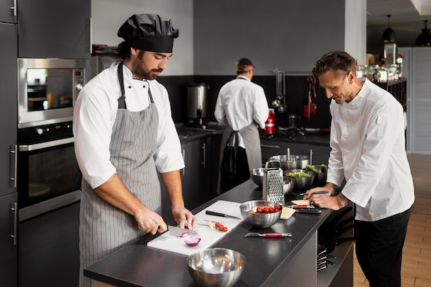 Photo chef working together in a professional kitchen