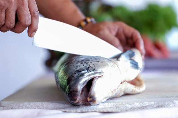 Photo the chefs are turning fish, salmon fish