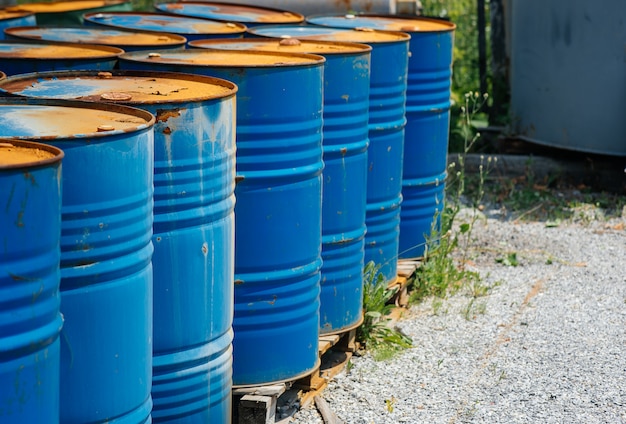 Chemical barrels in an open warehouse.