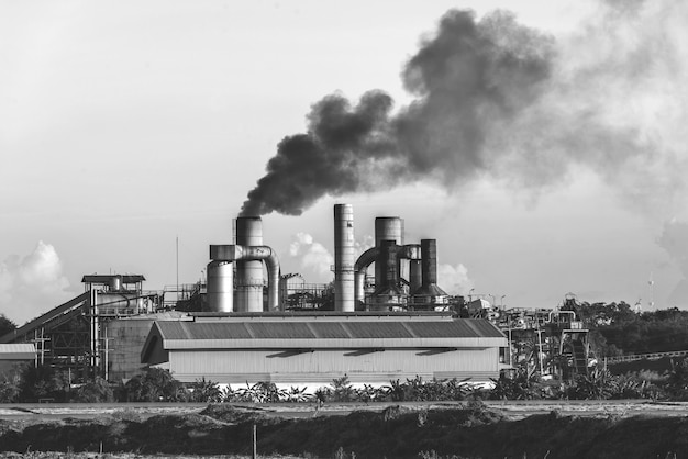 Chemical factory with smoke stack black and white tone