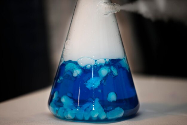 Photo chemical flask with blue solution experiences and experiments