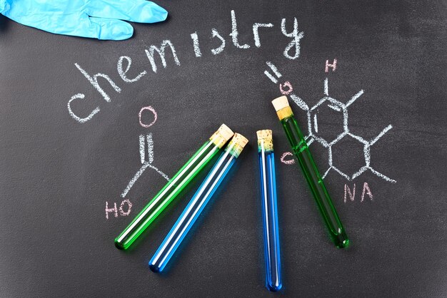 Chemical laboratory glass filled with multicolored liquid