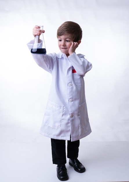 A chemical scientist child isolated on a white background.