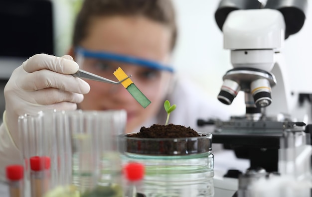 chemist in protective glasses