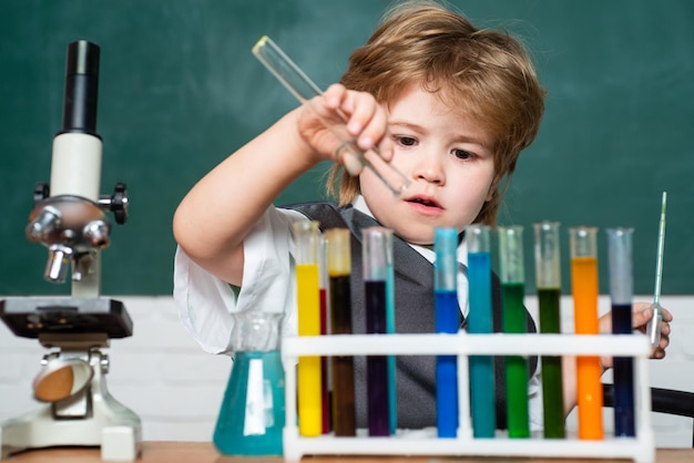 Chemistry science september  preschooler back to school science and education concept child from ele...