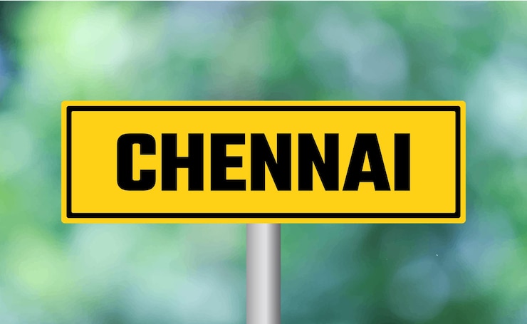 फोटो chennai road sign on blur background