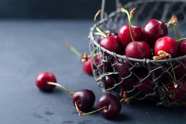 Cherries on black table