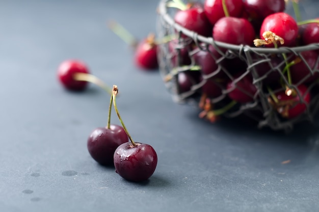 Cherries on black table