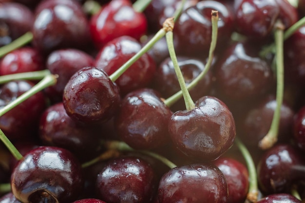 Cherries Cherry background Fruit background Wet cherry with leaves and drops