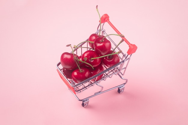 Cherries in a shopping cart