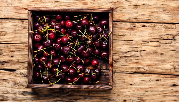 Cherries on wooden table