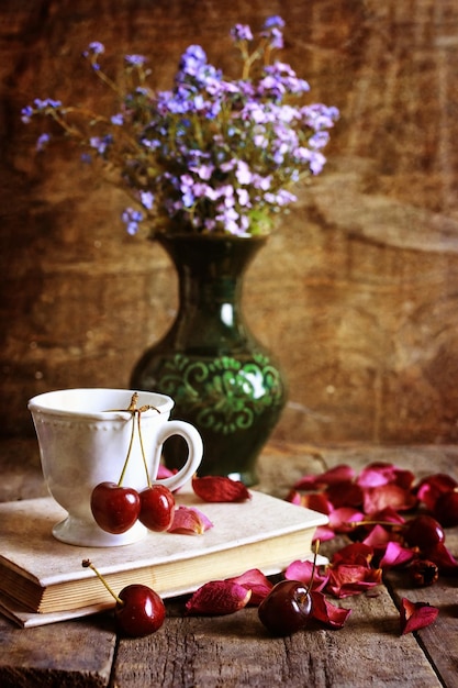 Cherry berry on wooden background retro