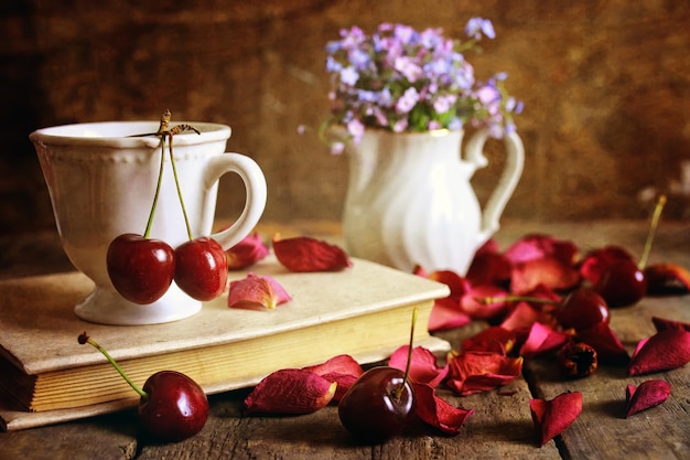 Cherry berry on wooden background retro