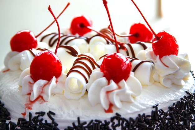 Cherry cake with white pipe chocolate