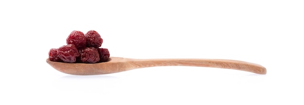 cherry dried on spoon isolated on white background