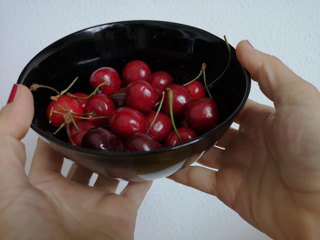 Photo cherry in the hand