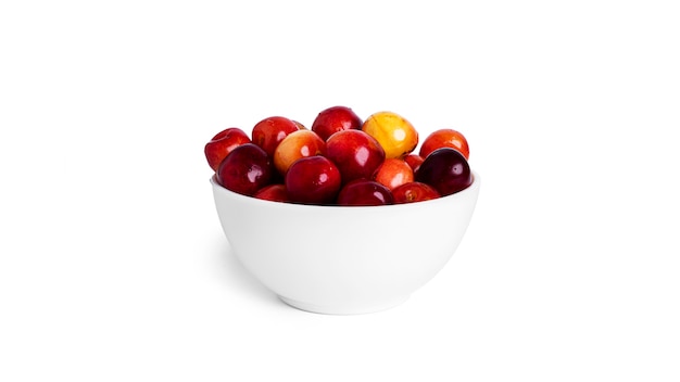 Cherry isolated on a white background. Sweet cherry berries on a white background. Red berries are isolated. Yellow cherry. High quality photo