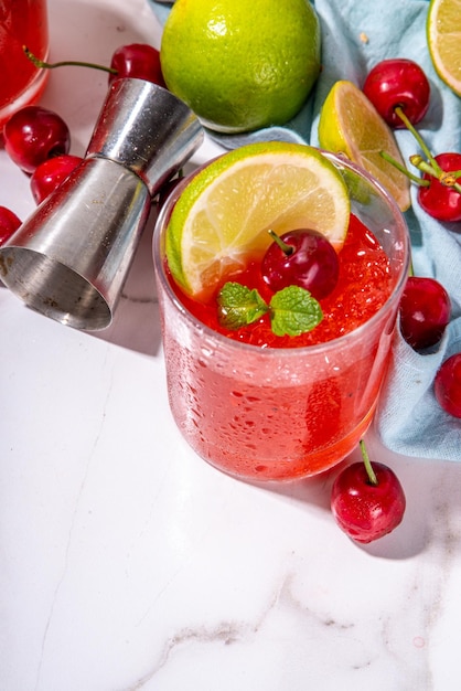 Cherry and lime alcoholic booze cocktail