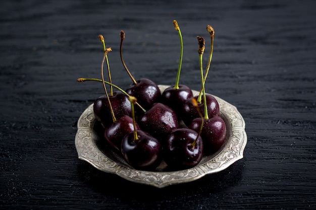 Cherry in a metal plate