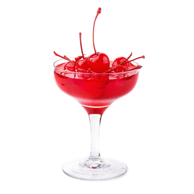 Cherry in syrup in a glass isolated on a white background