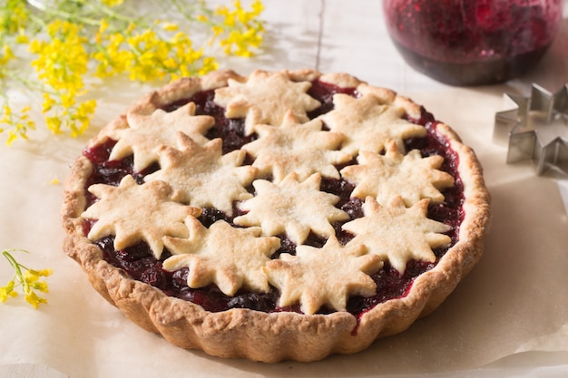 Cherry tart on wooden table