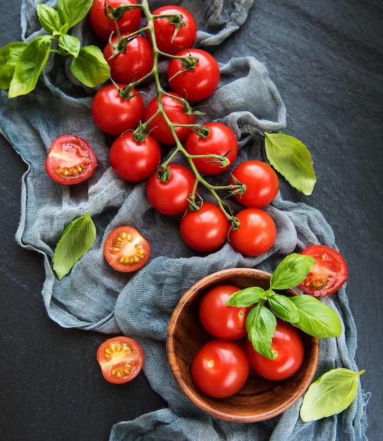 Cherry tomatoes on a black