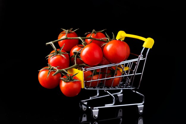 Cherry tomatoes in a small trolley