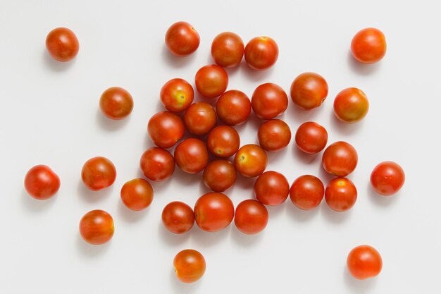 Cherry tomatoes on white background