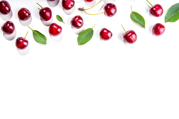 Cherry with leaf isolated on white