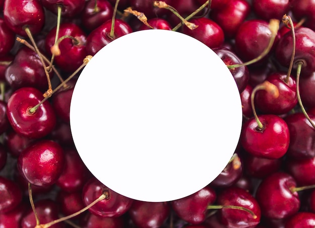 Фото cherry with white circle copy space