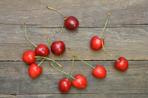 Cherry on wooden background