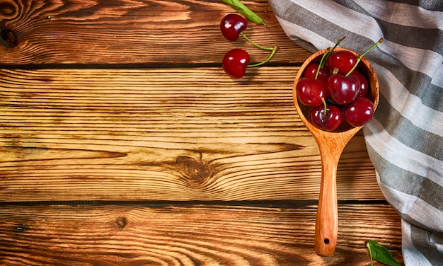 Cherry on the wooden table