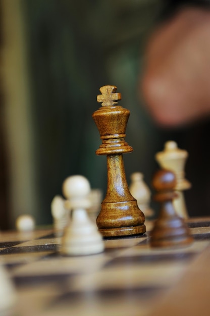 chess figures arranged on chess table closeup