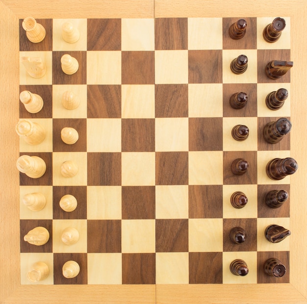 Chess figures on board background