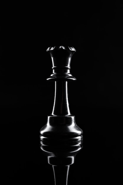 Chess figures on dark black  close up