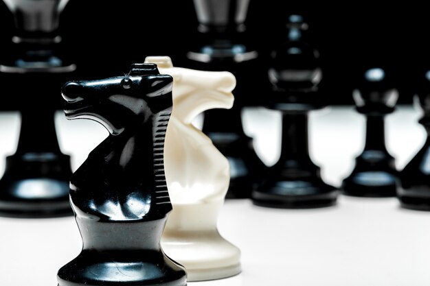 Photo chess game or chess pieces on white