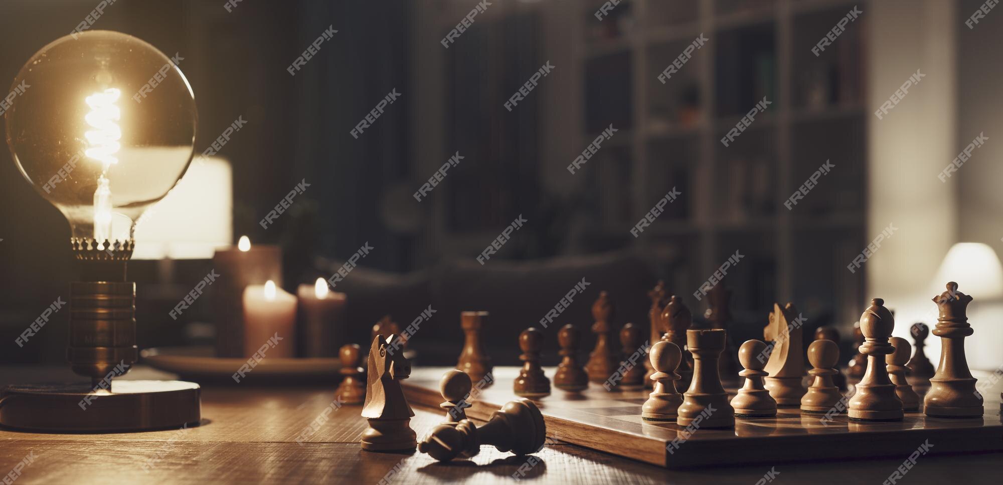 A completed chess game setup on a table with opposing chairs in a dark room  backlit by a bright window light - 3D render Stock Photo - Alamy