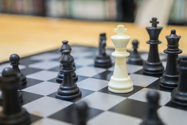 Chess pieces on board ideal for Leadership and business sale strategy concept